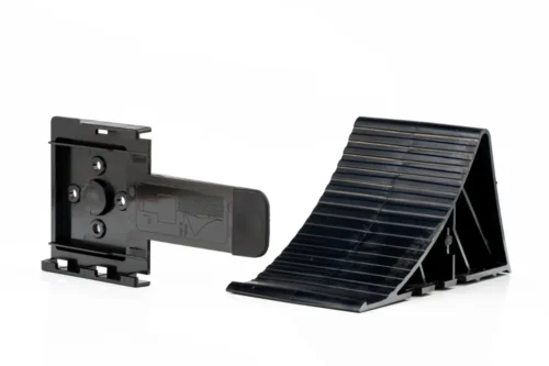 Fristom riteņa atbalsta ķīlis ar stiprinājuma turētāju